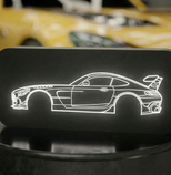 Svítící siluety aut